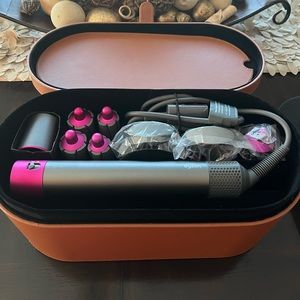 Dyson complete  air wrap styler like new in the case.